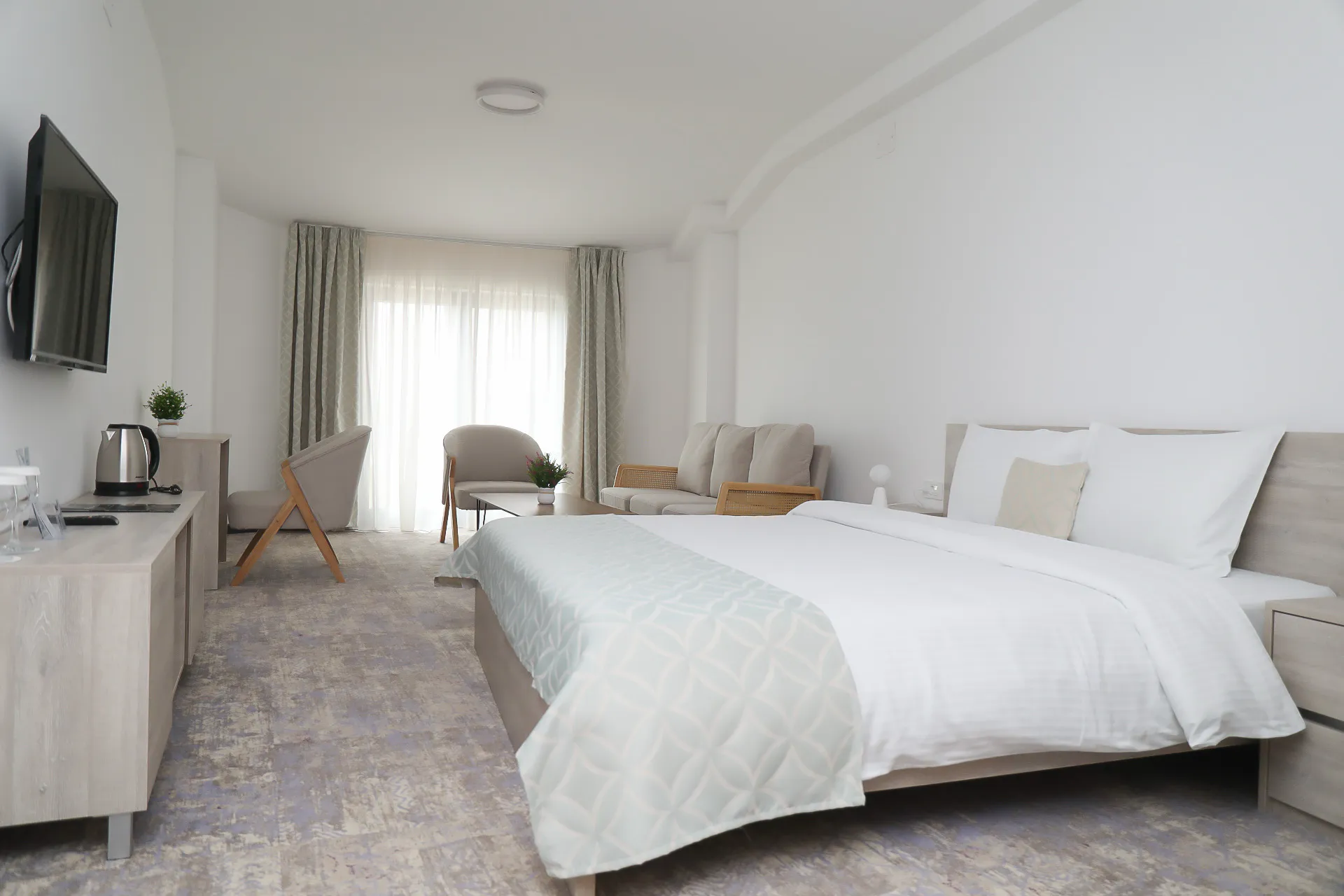 The Superior Double Room at Coconut, made up with white linen